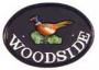 ovalhousesignsincastmetal_house signs in cast metal.jpg